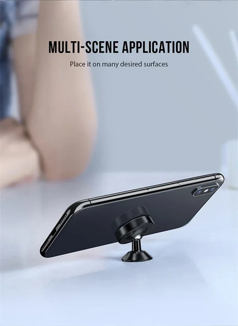 Suporte magnético universal para celular, compatível com diversas marcas (iPhone, Samsung, Xiaomi, Huawei). Possui fixação por adesivo, podendo ser instalado no painel do carro ou em paredes.